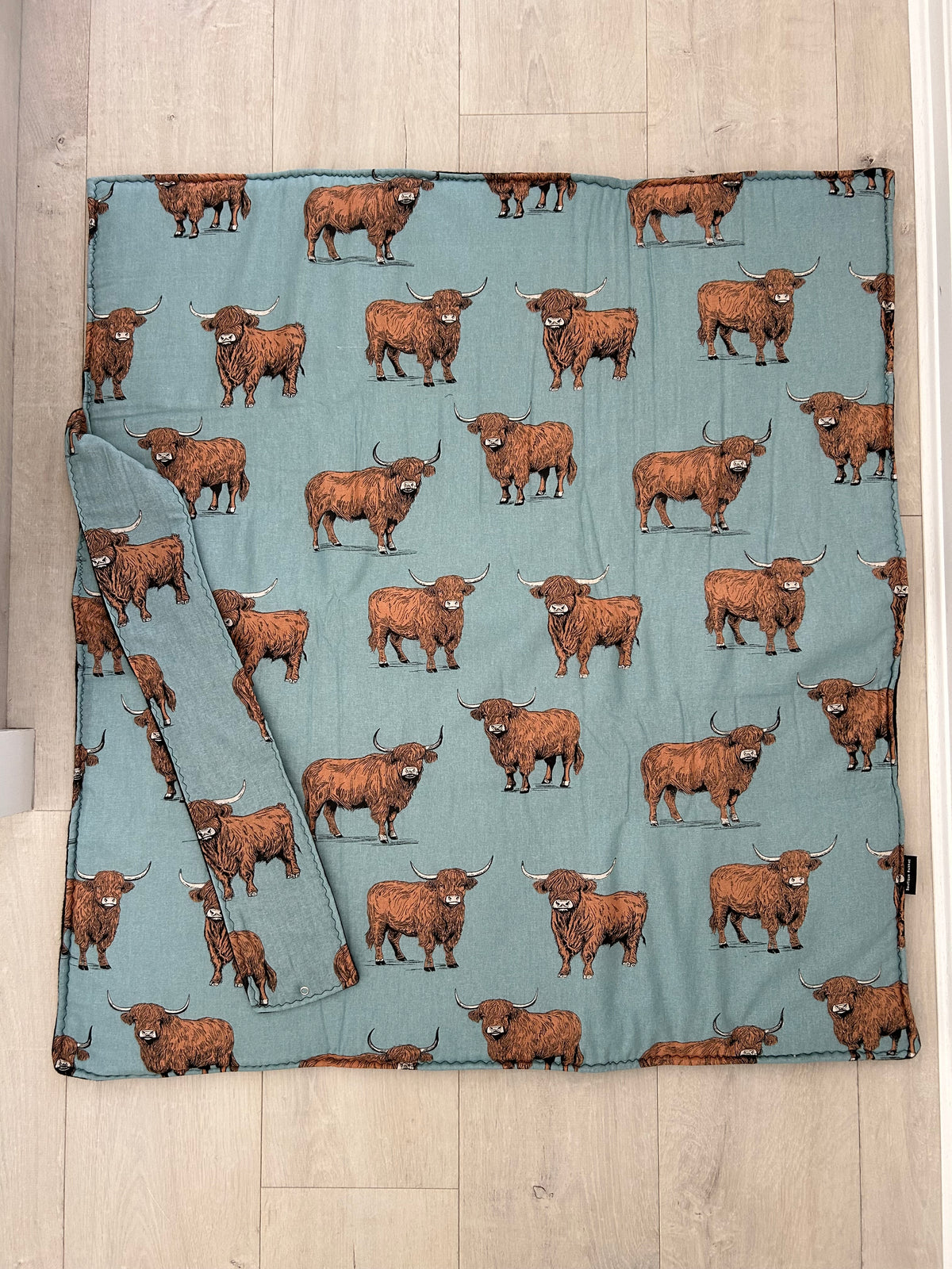 Highland cows travel play mat